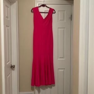 V cut front and back. Mermaid style. Worn once